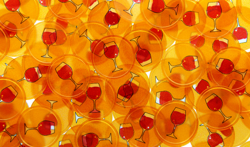 Round transparent orange In Stock Tokens printed with standard design