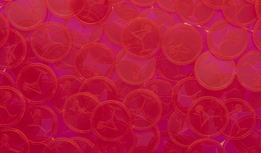 Transparent pink Tokens in Stock embossed with cocktail glass
