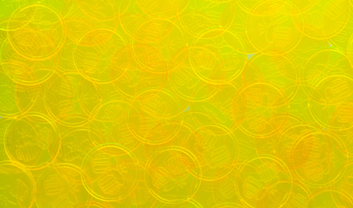 Transparent yellow Tokens in Stock embossed with beer glass