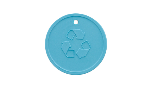 Round Embossed Recycled Plastic Token in pastel blue with pierced symbol